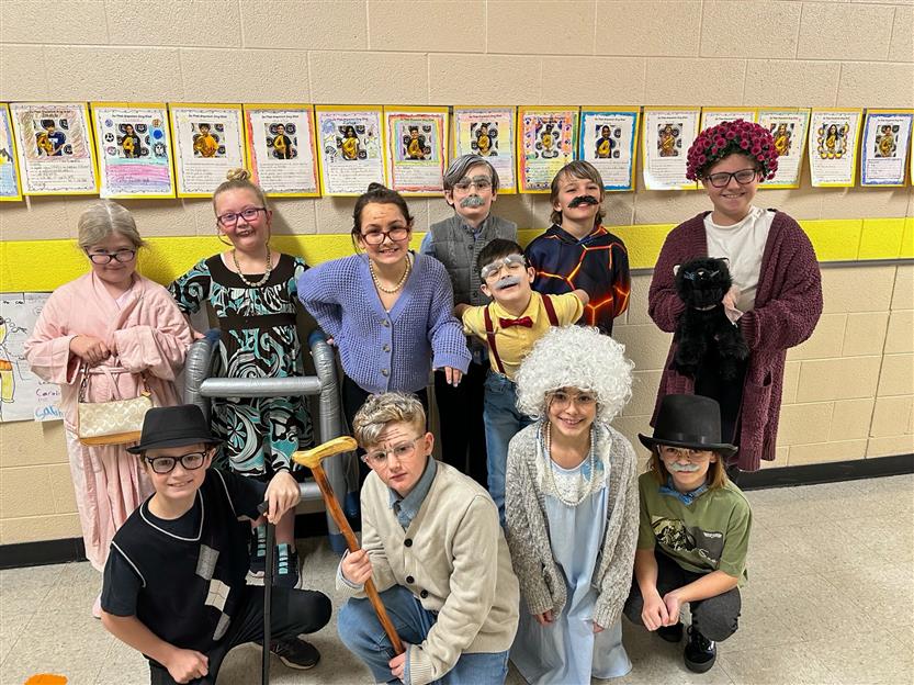 large group of students dressed as 100 year olds